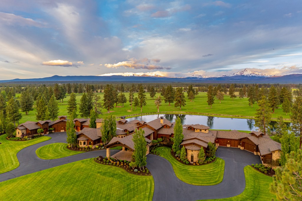 aerial view of Sisters, Oregon home with mountains in the distance