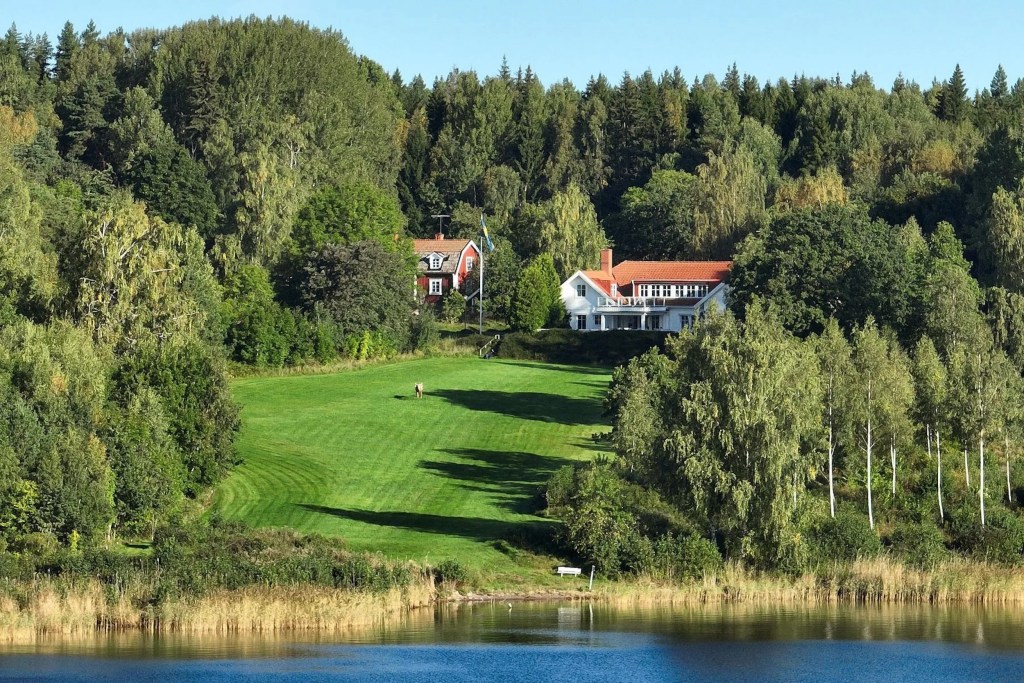 distant view of home in Stockholm with dock and waterfront