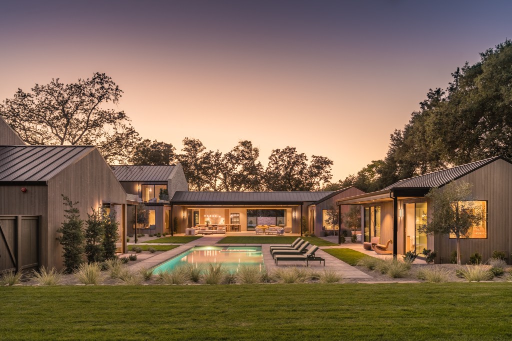 Contemporary home and pool in Sonoma, California, at sunset.