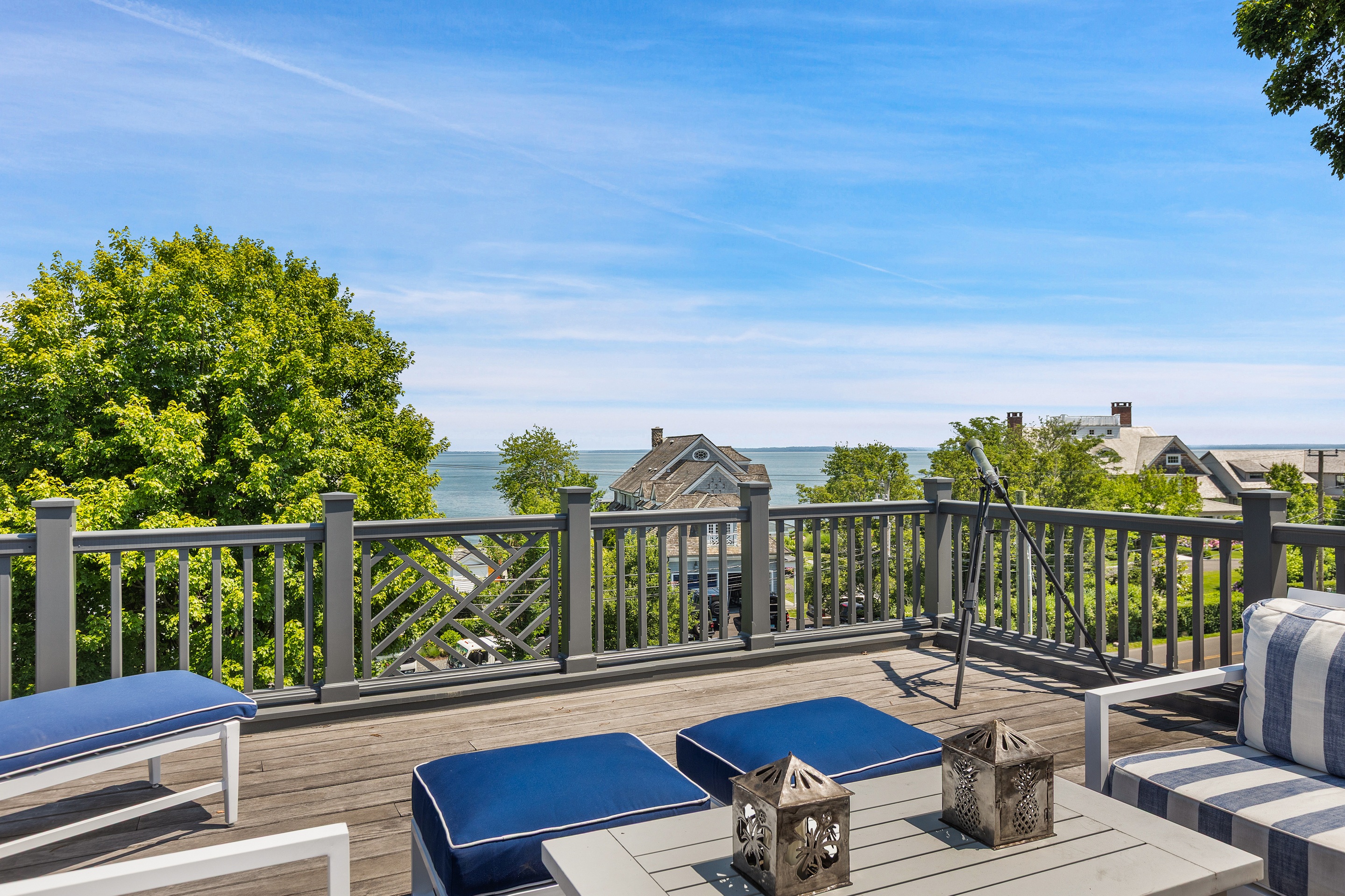 upper-level patio in New England home overlooking waterfront