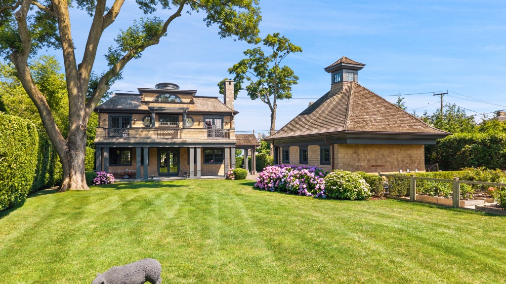 backyard of Greenwich home with vegetable garden