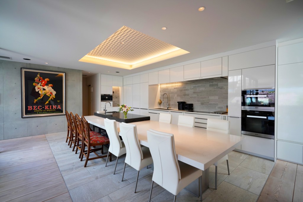 Dining room and kitchen in the Kyoto Luxury Sakura residence in Kyoto, Japan.