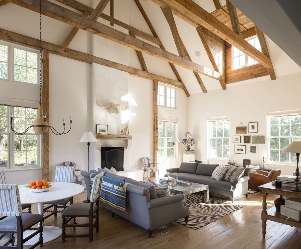 interior sitting room of Glen Ellen home with exposed reclaimed wood beams and abundant natural light