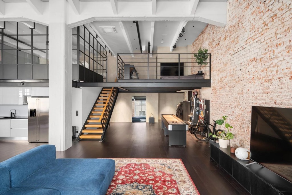 interior of Helsinki, Finland loft in the city with brick accent wall