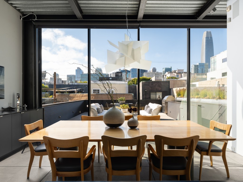 dining room in Gallery House leading out to terrace and grilling area with panoramic views of San Francisco