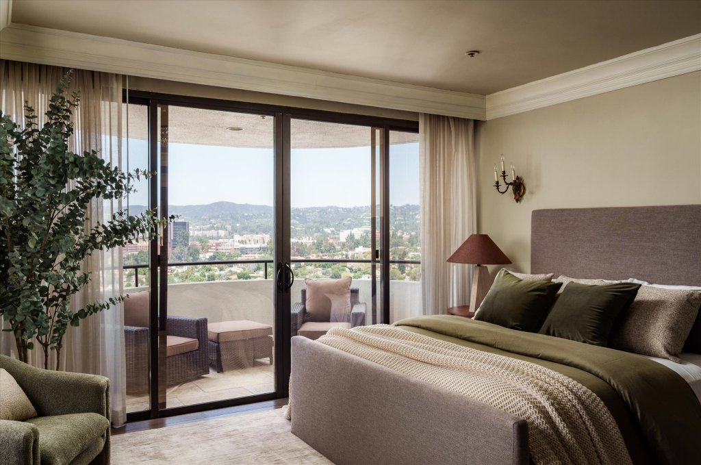primary bedroom with balcony overlooking Los Angeles 